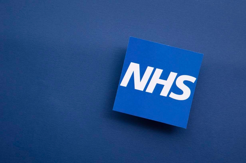 NHS 111 logo on a blue background, providing guidance on when to use it.