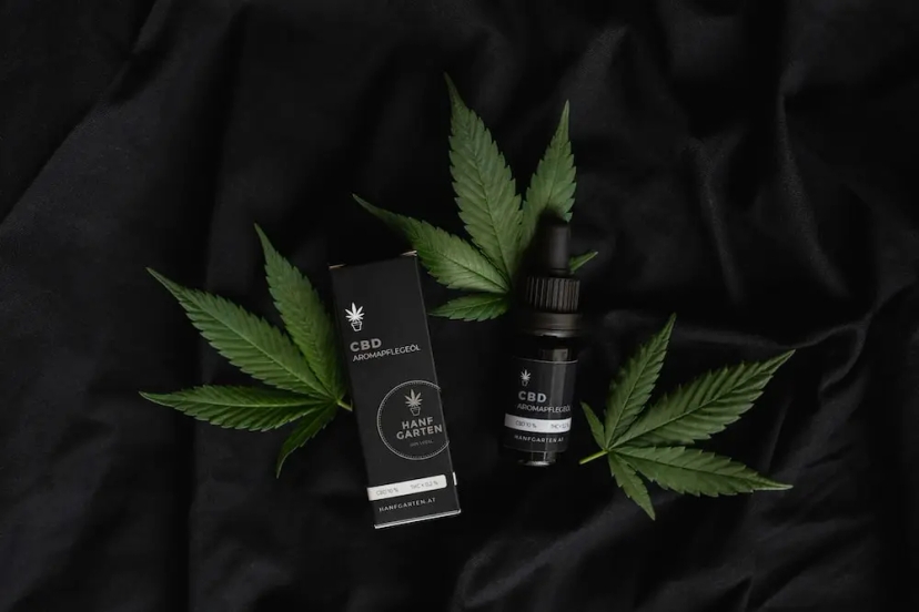 CBD oil on a black background.