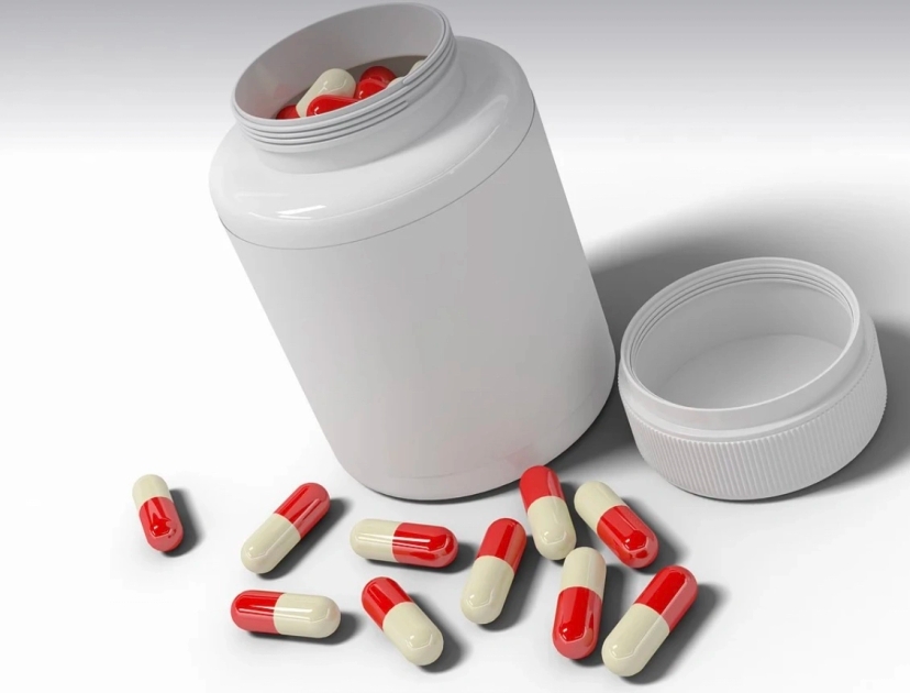3d model of a pill bottle with red and white pills featuring prescription drug savings.