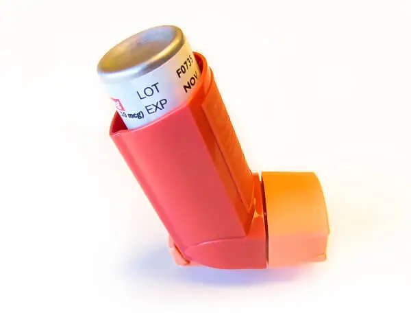 A withdrawn Flovent inhaler on a white background.