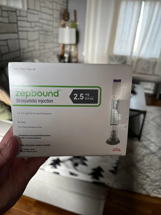 A person is holding up a box of zepbound that needs to be refrigerated.