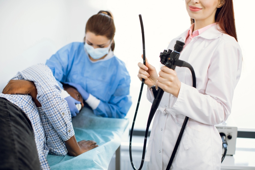 A patient taking a colorectal cancer screening test