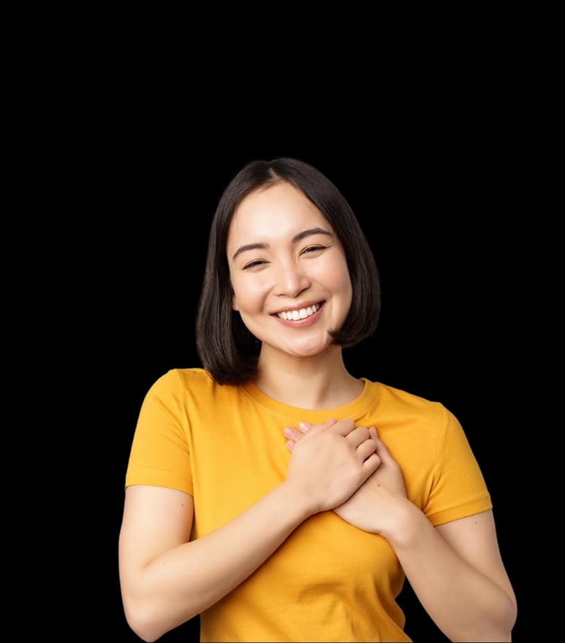 A happy woman in a yellow top on a purple background, representing NowPatient’s structured weight loss treatment cessation program
