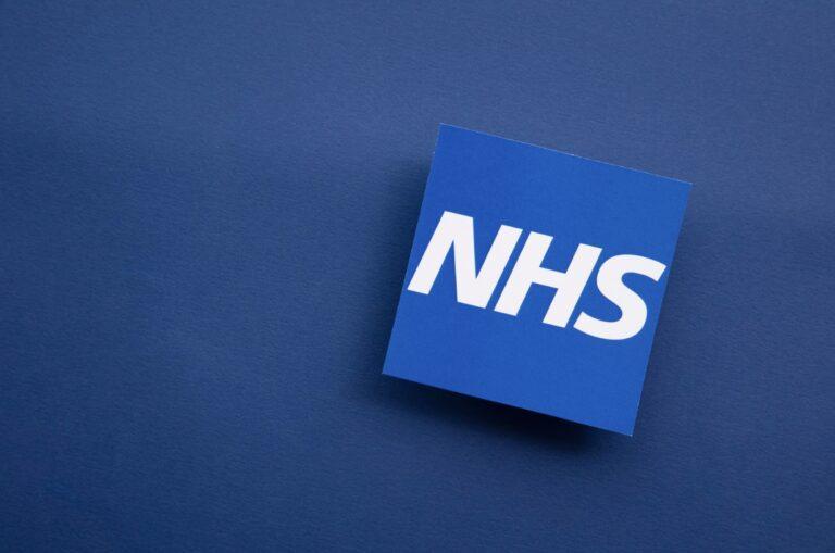 NHS 111 logo on a blue background, providing guidance on when to use it.