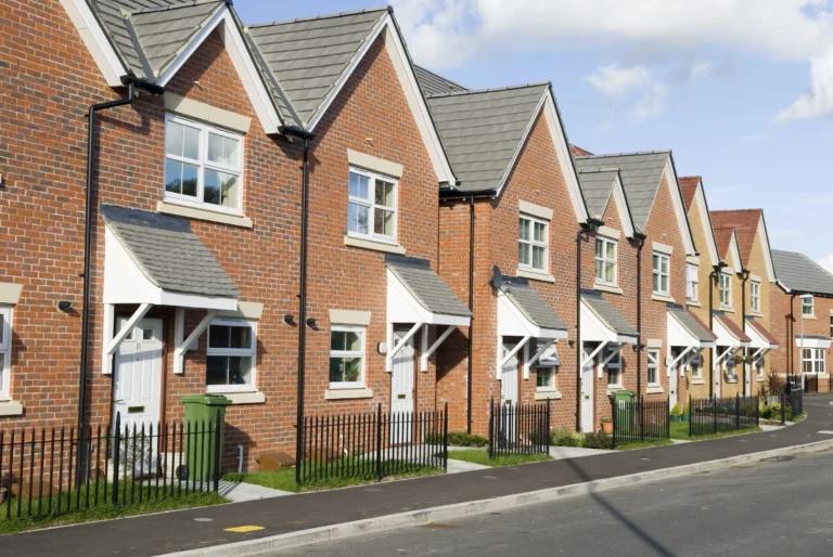 A row of red brick houses.