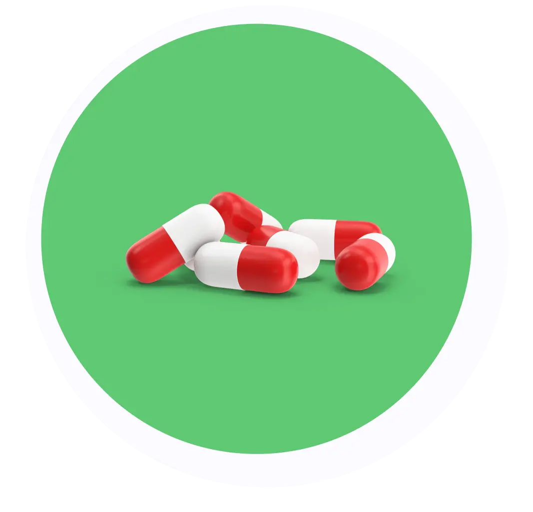 A cluster of red and white capsule-shaped pills is shown against a green background inside a white circle.
