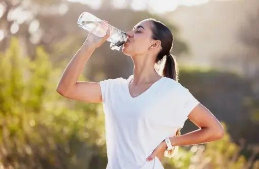 a lady drinking water