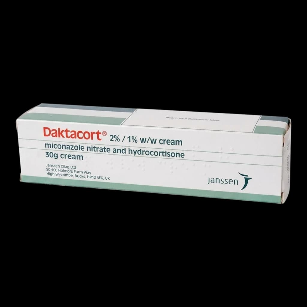 A box of Daktacort cream on a white background.