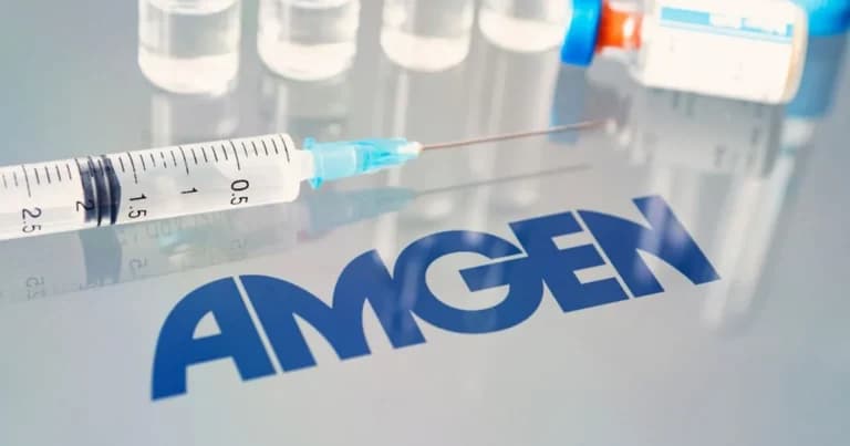 A syringe and vials on a reflective surface with the Amgen logo prominently displayed, containing the drug MariTide.