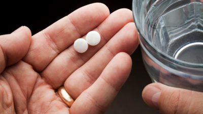Taking Aspirin Tablet