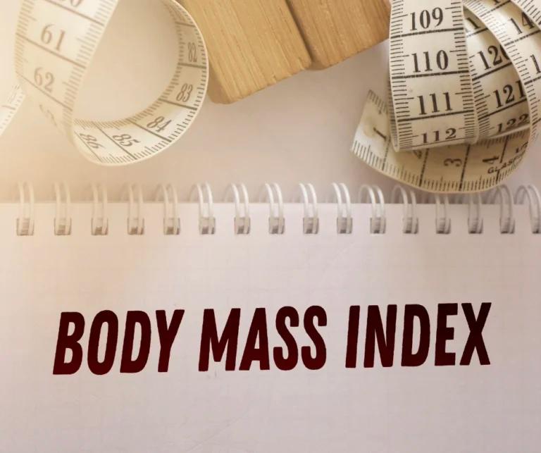A notebook with the word body mass index on it documenting the history and development of BMI over time.