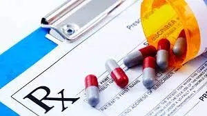 A GSK prescription drug savings sheet with a bottle of pills.