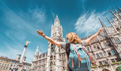 A woman with a backpack exploring abroad in Munich.