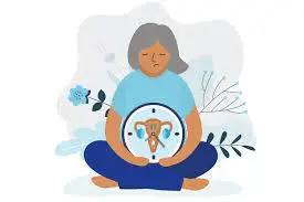 A woman is sitting in a lotus position, finding peace amidst the end of menopause.