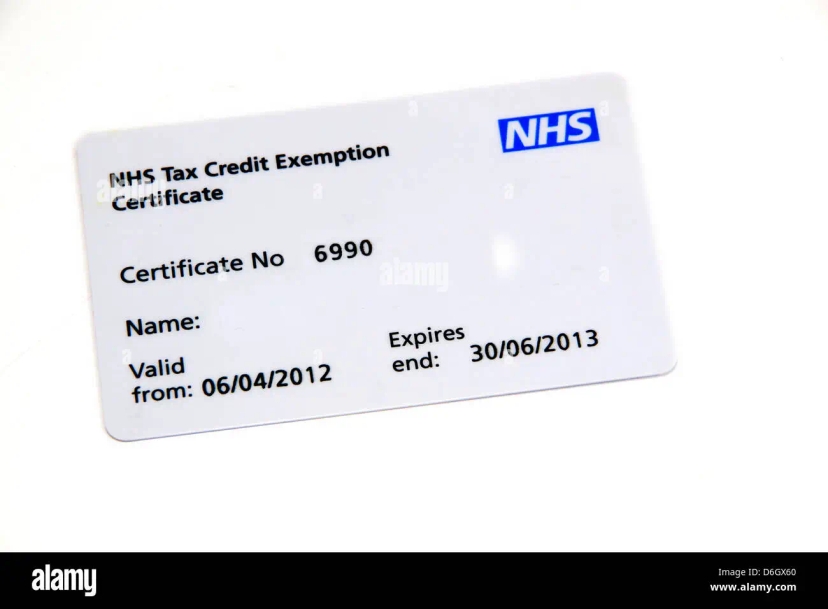 A NHS prescription exemption card on a white background - stock image.