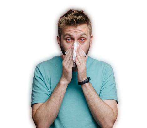Man blowing his nose into a tissue, not enough information provided.