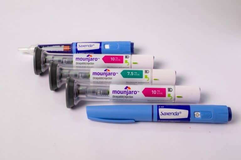 Four Zepbound medical injection pens with labeled dosages on a white background.
