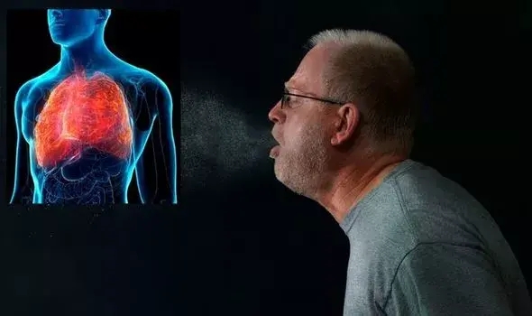 A person coughing due to a chest infection