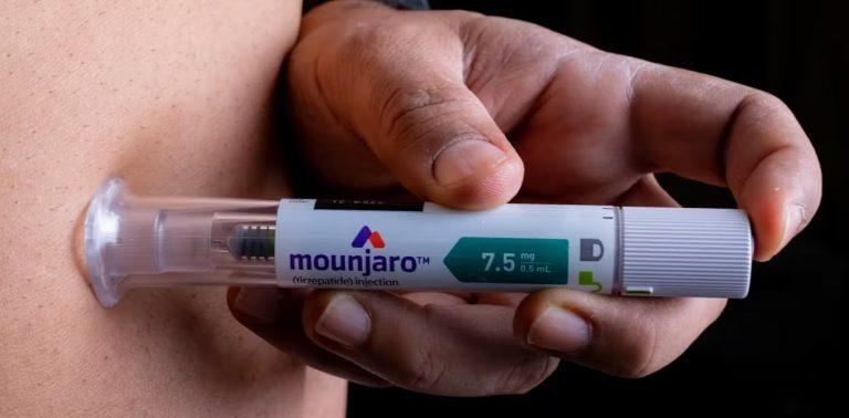 A photo of a patient injecting Mounjaro, a medication by Eli Lilly, potentially used for weight loss.